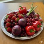 Ricette con gli ortaggi rossi. Immagine generata da Google Gemini.